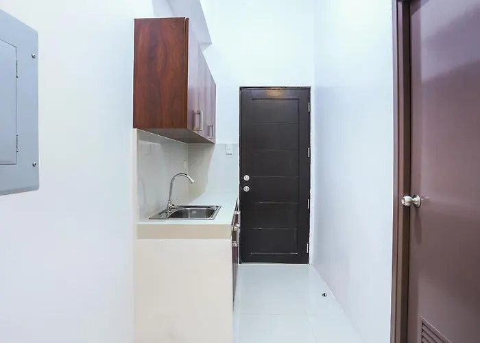 Oyo 505 Jardin Suites Hotel